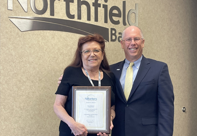 <p>Steve Klein, President &amp; CEO, presents a plaque from NJ Bankers to Dana Mihailovic honoring her for 45 years in the banking industry. Dana works in our Compliance department.</p>